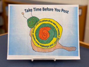 Joseph Alkhoury's winning poster contest entry, "Take time before you post"