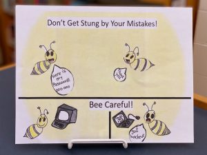 Whitney Hohmann's winning poster contest entry "Don't get stung by your mistakes, bee careful"