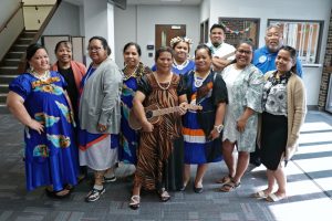 Members of the Dubuque Marshallese Community gather in the Board Room during a recent School Board eeting.
