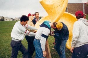 Parents and teachers installing $10,000 of new playground equipment. (1989)