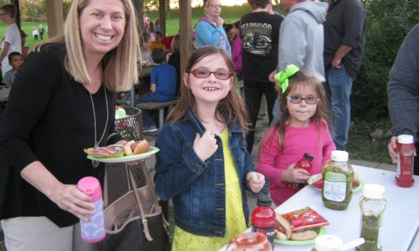 News families gather for the school picnic