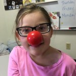 Student with red nose